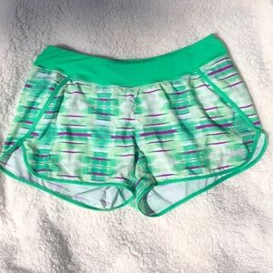 The North Face green, purple & wht running shorts
